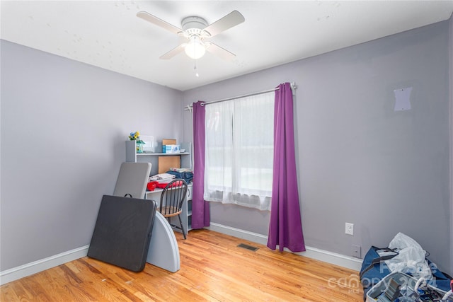 interior space featuring light wood-type flooring and ceiling fan