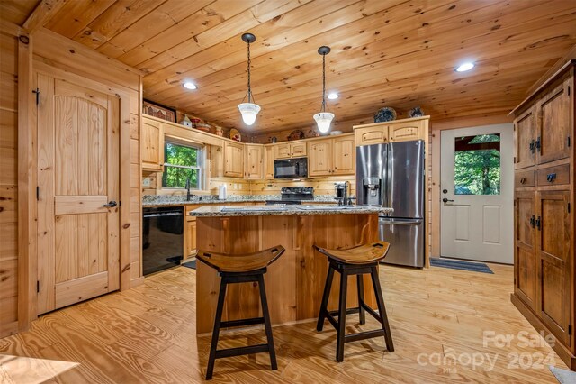 kitchen with light wood-type flooring, black appliances, wood ceiling, and a kitchen island