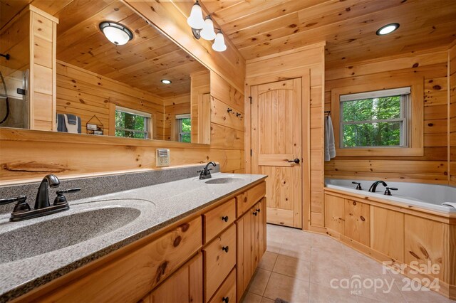 bathroom featuring tile patterned floors, wooden ceiling, a washtub, wood walls, and vanity