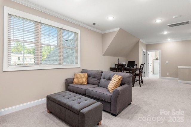 living area featuring light carpet, visible vents, baseboards, and ornamental molding