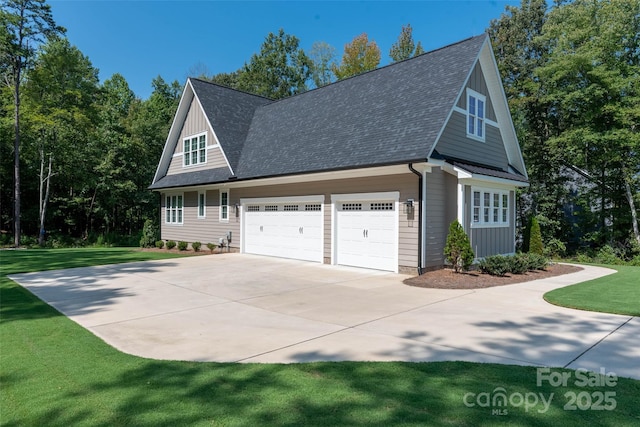 view of home's exterior featuring a garage and a lawn