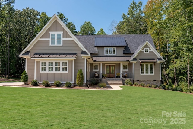 859 Irish Creek Dr, Landis, NC 28088 - craftsman house featuring board and batten siding, a porch, a standing seam roof, and a front yard