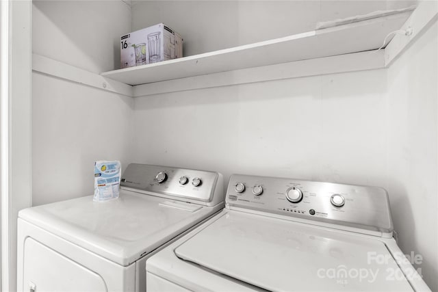 laundry room with independent washer and dryer