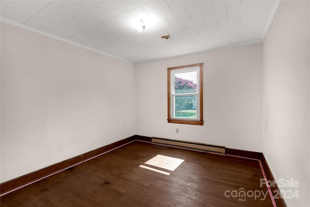 unfurnished room with a baseboard heating unit, crown molding, and dark hardwood / wood-style flooring