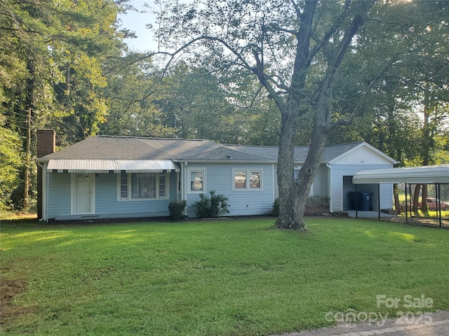 single story home with a carport and a front yard