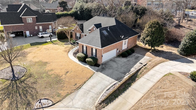 birds eye view of property with a residential view