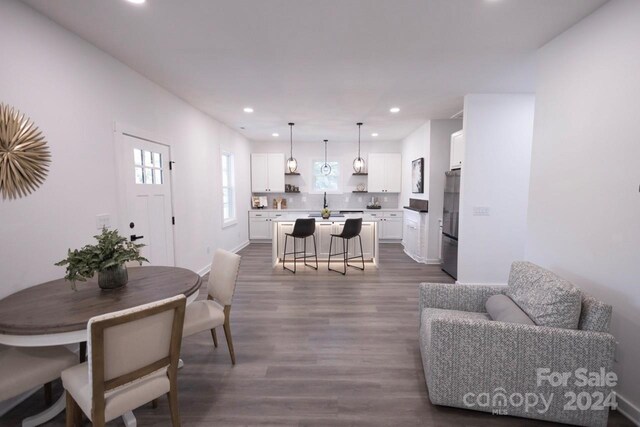 living room featuring dark wood-type flooring