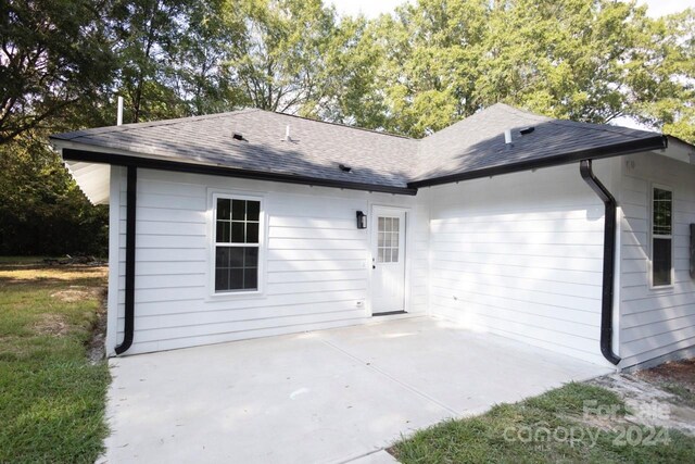 rear view of property with a patio area