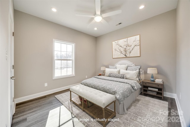 bedroom featuring ceiling fan and wood-type flooring