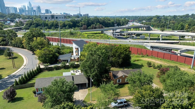 birds eye view of property with a view of city