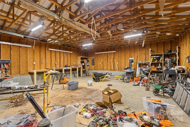 garage with a workshop area