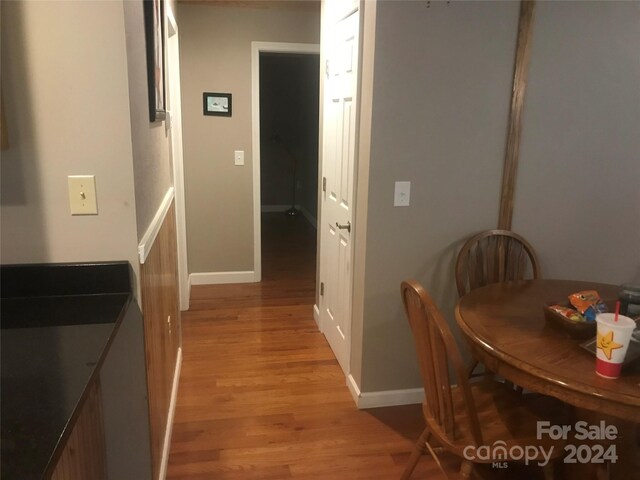 hall with light hardwood / wood-style flooring