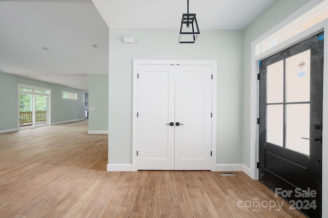 foyer with light hardwood / wood-style flooring