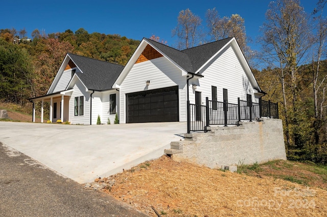 view of home's exterior with a garage