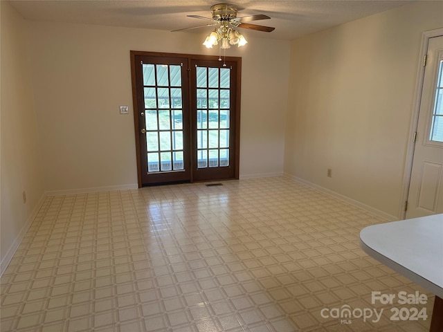 spare room featuring ceiling fan