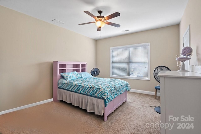 carpeted bedroom with ceiling fan