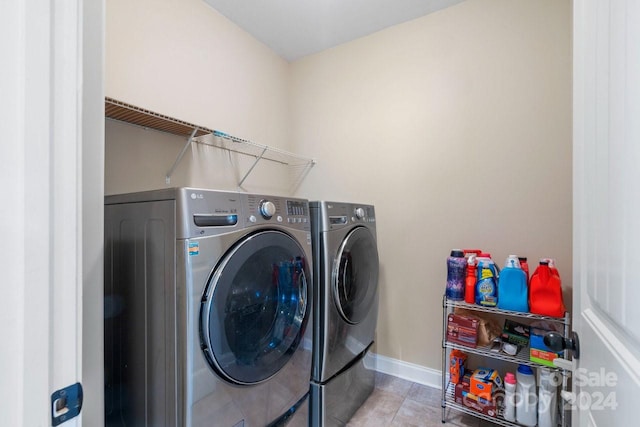 washroom with independent washer and dryer