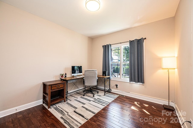 office space with hardwood / wood-style floors