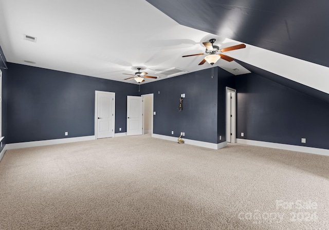 bonus room with carpet, vaulted ceiling, and ceiling fan