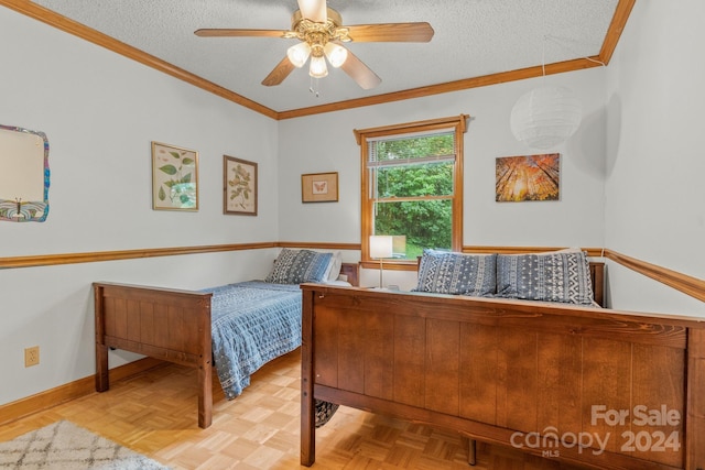 bedroom with a textured ceiling, light parquet floors, and ceiling fan