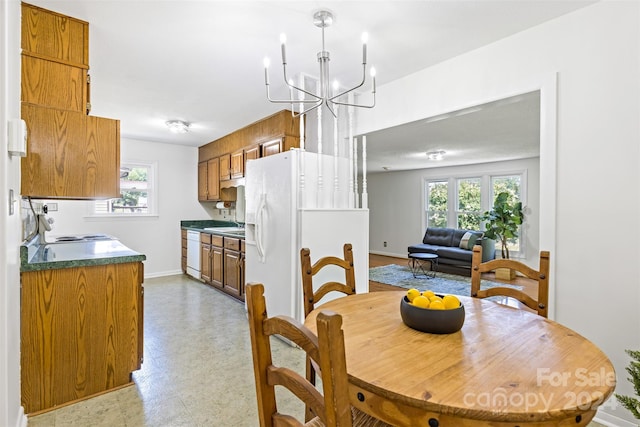 dining room featuring an inviting chandelier