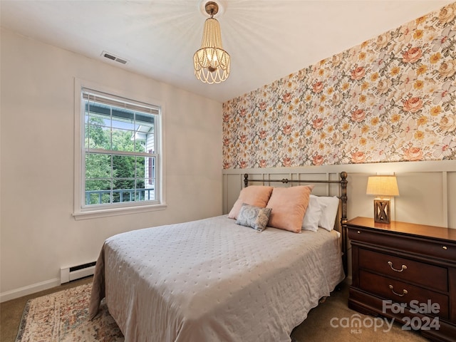 bedroom with visible vents, baseboard heating, a chandelier, wallpapered walls, and baseboards
