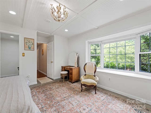living area with ornamental molding, baseboards, and recessed lighting