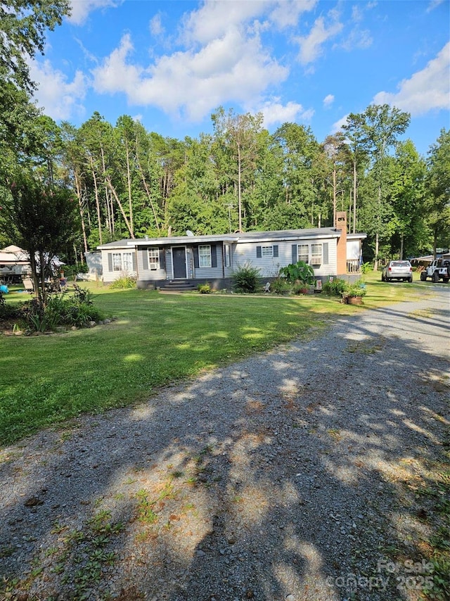 view of front facade with a front lawn