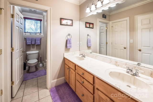 bathroom with vanity, crown molding, toilet, and tile patterned flooring