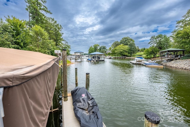 dock area featuring a water view and a gazebo