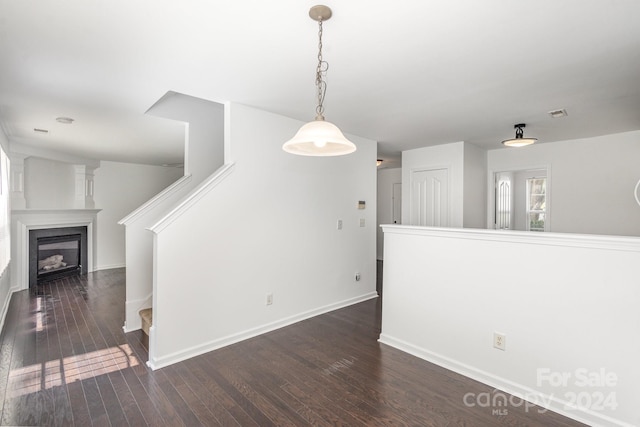 interior space with dark hardwood / wood-style floors