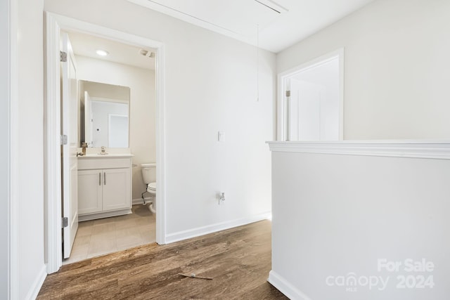 hallway with dark hardwood / wood-style floors