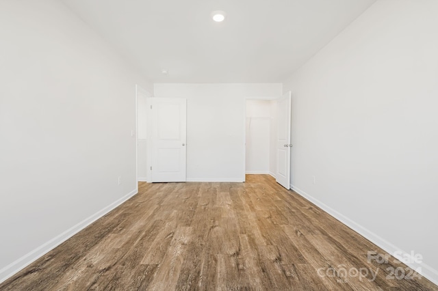 unfurnished room featuring light hardwood / wood-style floors