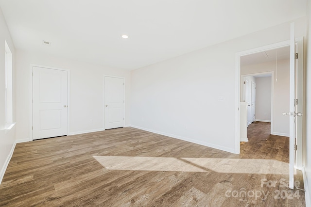 unfurnished bedroom featuring light hardwood / wood-style flooring