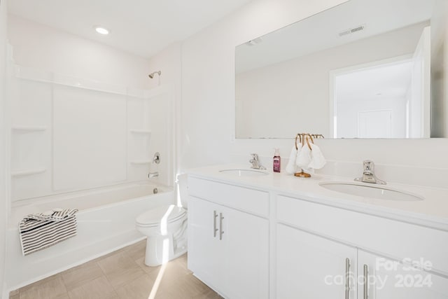 full bathroom with vanity, shower / bathtub combination, and toilet