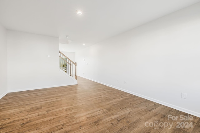 spare room featuring hardwood / wood-style floors