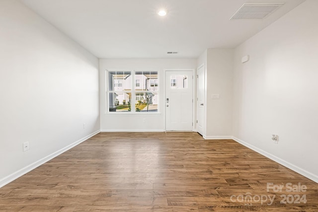 foyer entrance with wood-type flooring