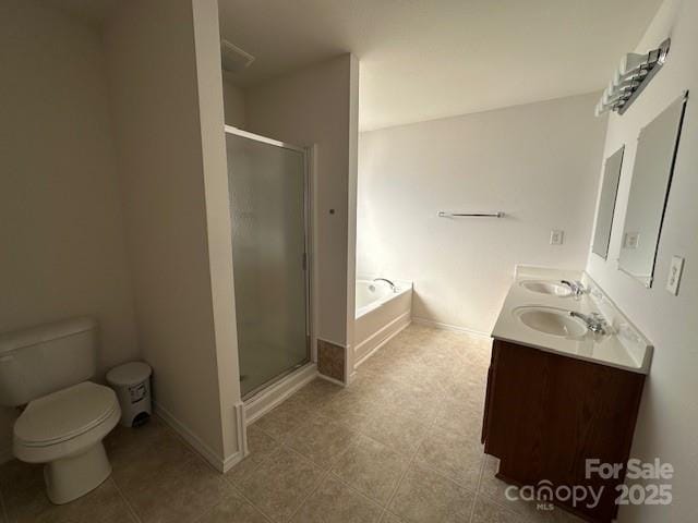 bathroom with a sink, a stall shower, double vanity, and a bath