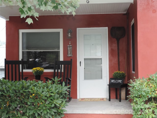 1555 Soco Rd Unit 6, Maggie Valley, NC 28751 - doorway to property featuring stucco siding