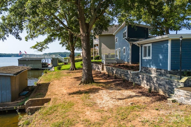 view of yard with a water view