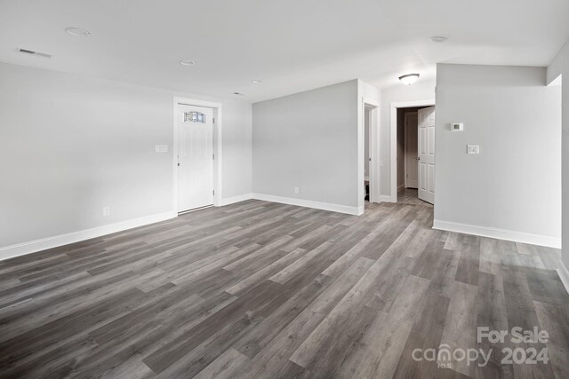 spare room featuring hardwood / wood-style floors