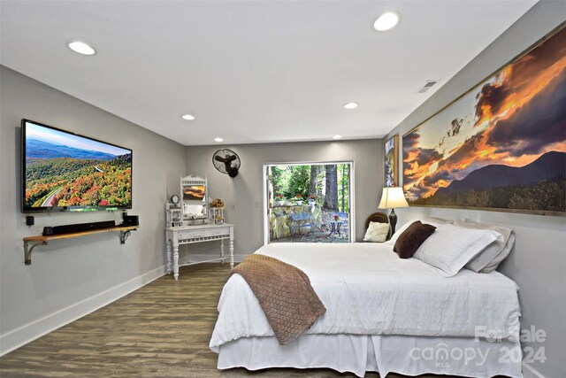 bedroom with wood-type flooring