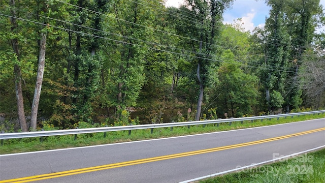 view of street featuring a view of trees