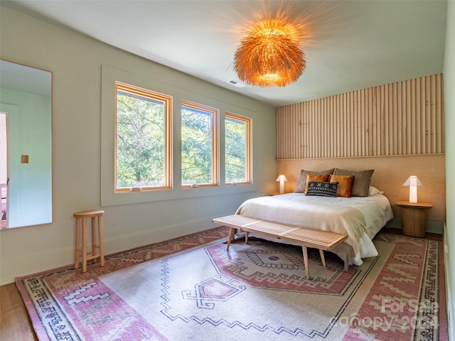 bedroom featuring hardwood / wood-style floors