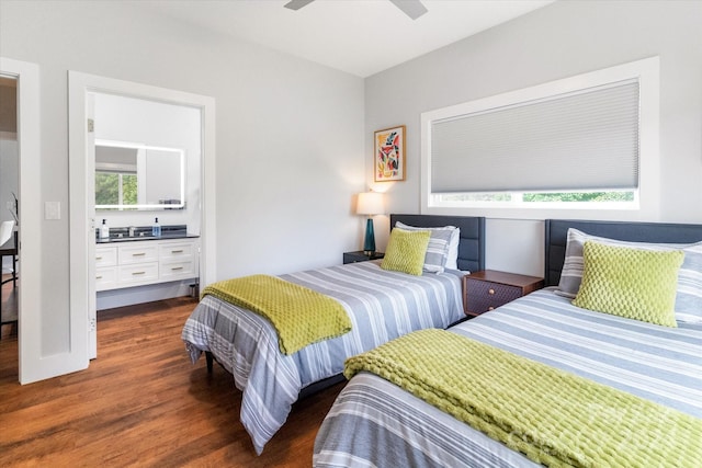 bedroom with ceiling fan and dark hardwood / wood-style flooring