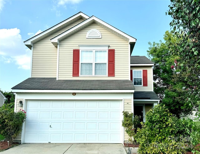 view of front property with a garage