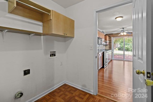 laundry area with hookup for a washing machine, cabinets, ceiling fan, and electric dryer hookup