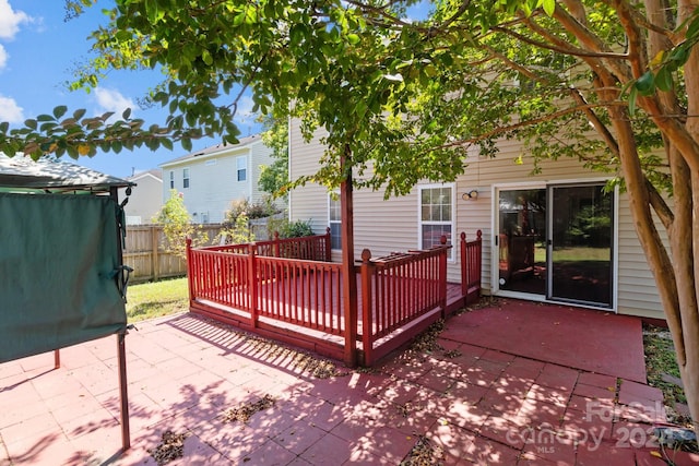 exterior space featuring a patio area and a deck