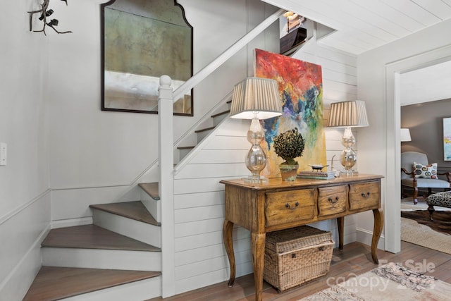 stairway featuring hardwood / wood-style flooring