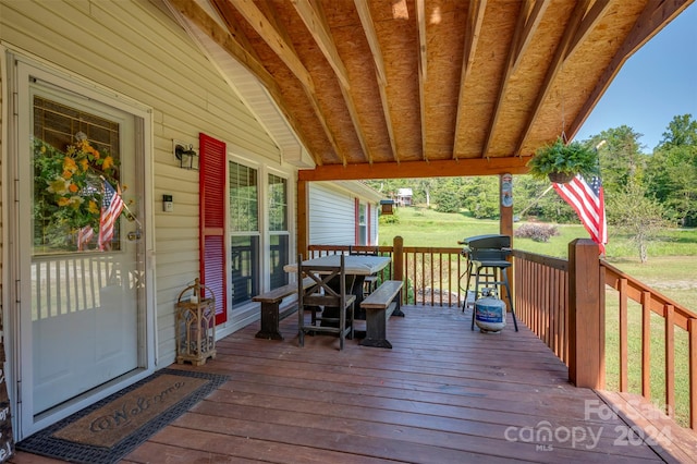 deck featuring a grill